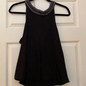Free People halter knit top with sequined trim.